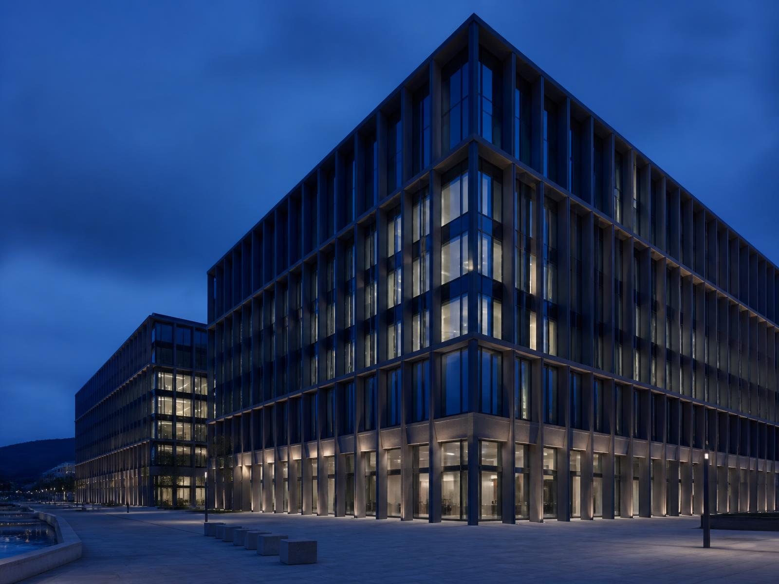 Modern Swiss financial district architecture at blue hour